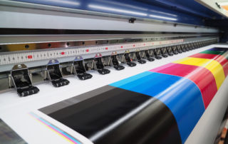 Close-Up-Of-Wide-Format-Printer-Showing-CMYK