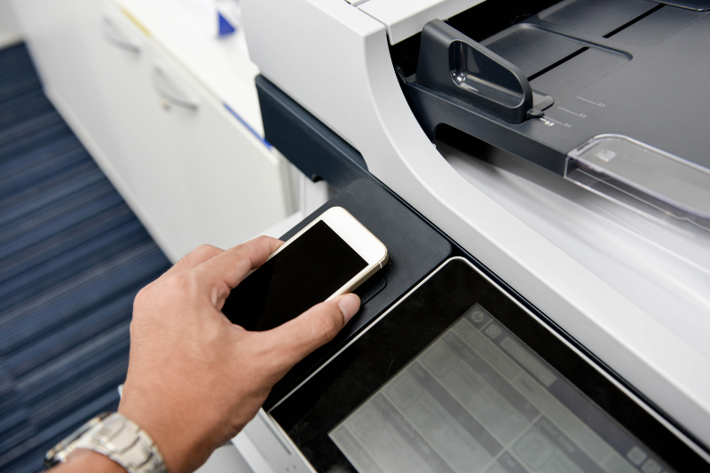 printer security verifying identity with smartphone at a copier