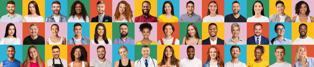 Cheerful Group Of Millennial Men And Women Smiling At Camera