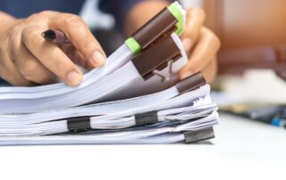 Document Management Systems stacks of paper