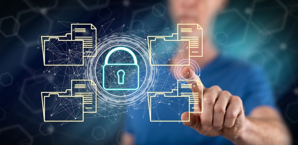 Man touching a data security concept on a touch screen with his finger. document security concept